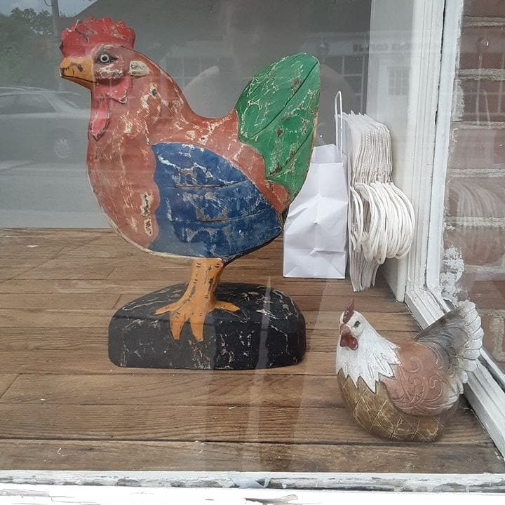 Hen decorations in window