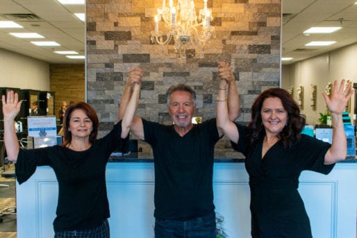 Group photo of Hair Plus owners