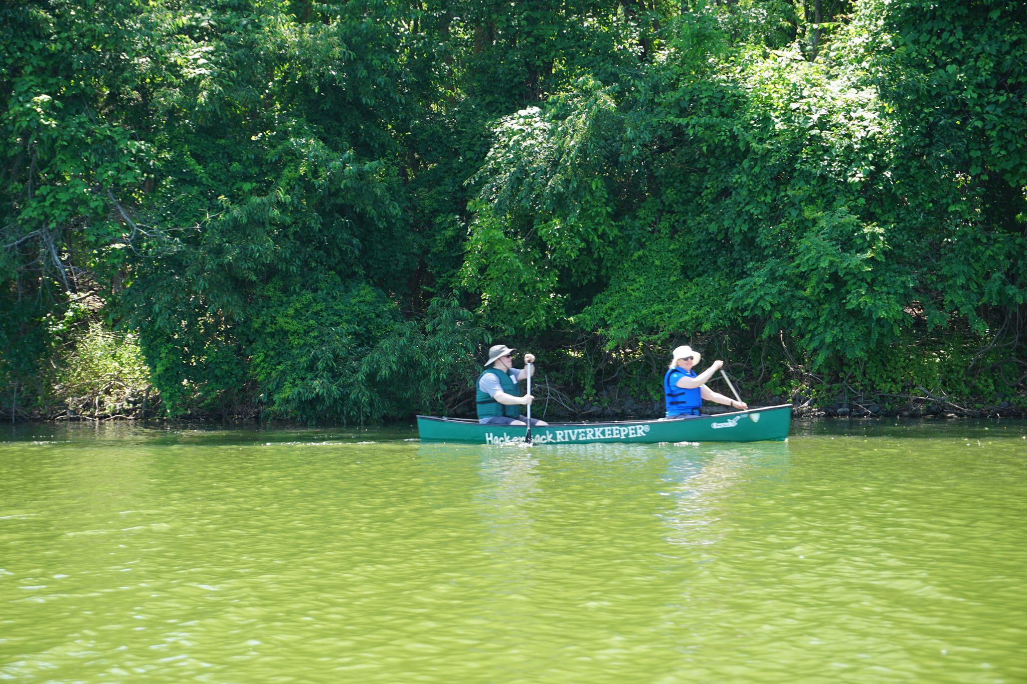 People Kayaking Hackensack River