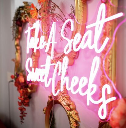 Wall Decor saying "Take a seat sweet cheeks"