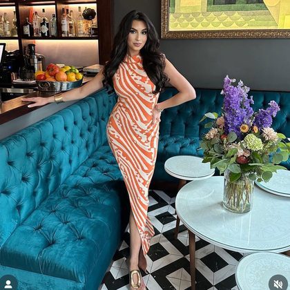 Woman Posing at Bar